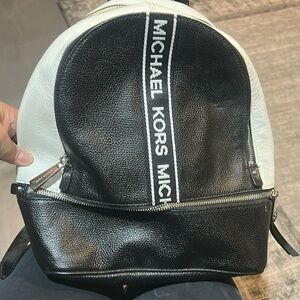 Michael Kors black and white backpack.  Only used once!
